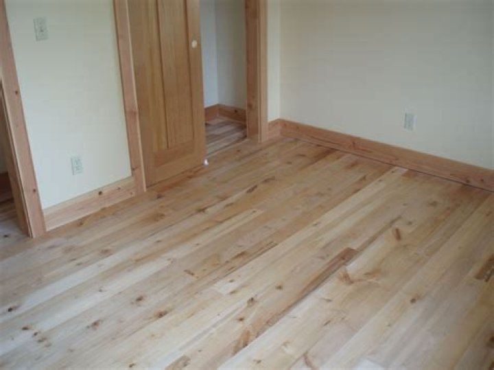 Do hardwood floors need to match baseboards